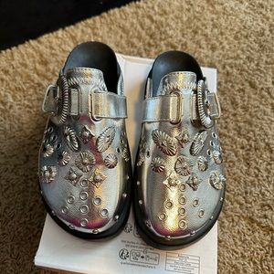 Platform mules with metallic rhinestone decor